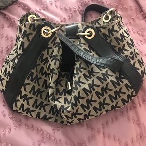 Black Michael Kors signature bag